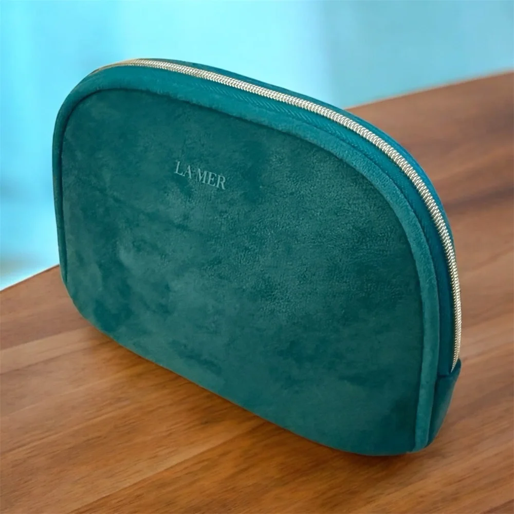 New La Mer Teal Cosmetic Bag
